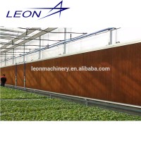 Multi-Span Agricultural Greenhouses Type and paper Cover Material greenhouse evaporative cooling pad